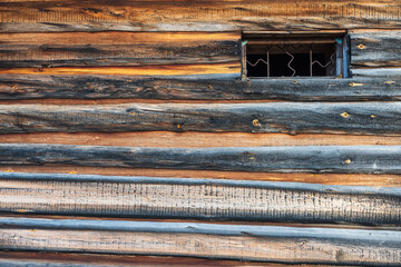 Wooden wall with small window