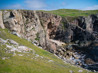 Eroded sea cliffs on the west coast of Kettla Ness off the west coast of Mainland, Shetland. These...