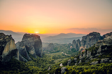 Fototapeta na wymiar A beautiful panoramic view of a sunset at the rock formation of Meteora in Greece