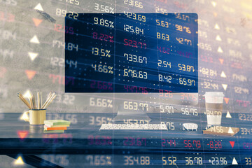 Financial graph colorful drawing and table with computer on background. Double exposure. Concept of international markets.