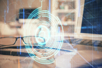 Data tech hologram with glasses on the table background. Concept of technology. Double exposure.