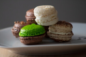 macarons food background, sweet and crunchy on a white plate