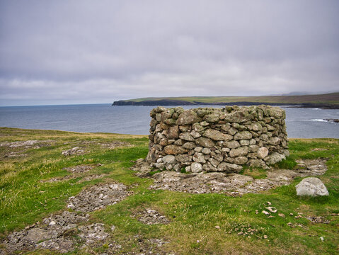 A planticrub on the Hill of Ure overlooking the Dale of Ure in north Shetland, UK. A planticrub is a small circular dry-stone enclosure used traditionally in Shetland for growing young kale plants.