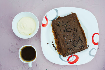 Freshly baked homemade cake with dark chocolate and cacao