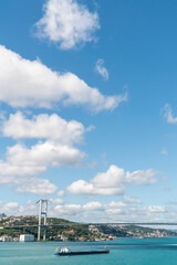 Fototapeta na wymiar Bosporus Bridge under beautiful sky in a sunny day
