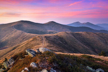Landscape with amazing sunrise. Autumn morning in high mountains. Natural scenery. A place to relax in the Carpathian Park.