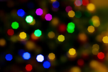 Abstract blurred disfocused Christmas lights festive background.