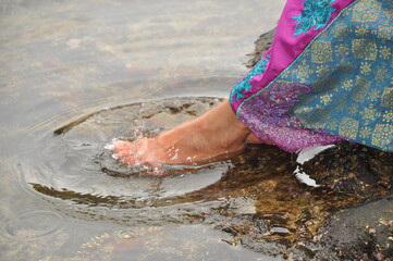 feet on the beach