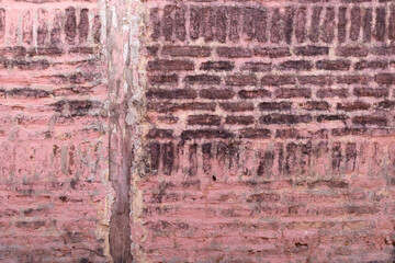 Grunge brick wall texture background colored red stone block.