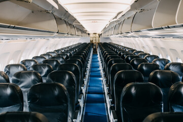 Empty seats in row in a commercial airplane.