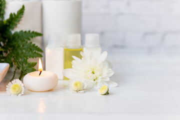 Fototapeta na wymiar soft focus. Spa beauty massage health wellness. Spa Thai therapy treatment aromatherapy for body woman with white flower nature candle for relax and healthy care.  