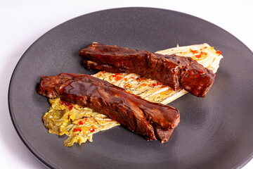 Beef in meat sauce on plate