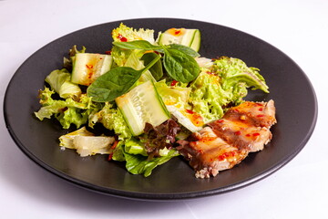 Salad with eel and cucumber