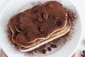  A piece of delicious tiramisu is the perfect breakfast or dessert. Star anise and cane sugar complete the composition