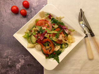 Tender grilled beef filet strips served over mixed salad with balsamic dressing. Summer classic steak salad.