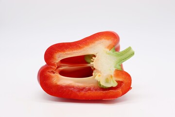 sliced red bell pepper on white background