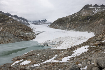 Rhone glacier with lake and rocks