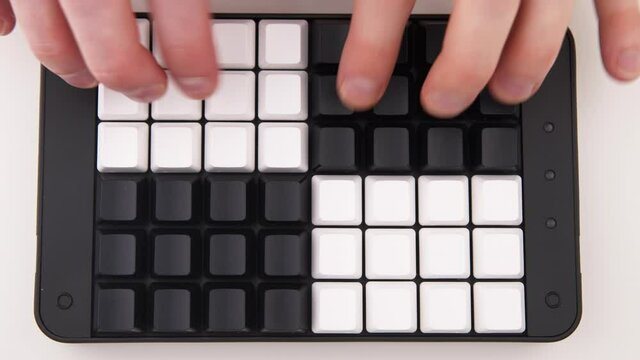 Hands typing fast on Unlabeled keyboard