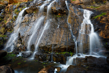 Obraz premium Cascading waterfall after rain in Brigadoon, Swan Valley, Western Australia