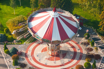 Carousel in the amusement Park. Outdoor activities. Leisure activities. Fair. Enjoyment. Aerial view 