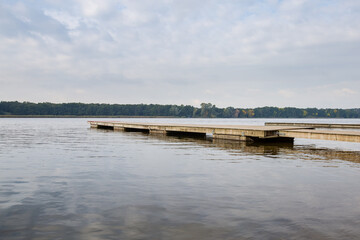 Fototapeta na wymiar Large lake, clean beach with no people, tourist season, summer