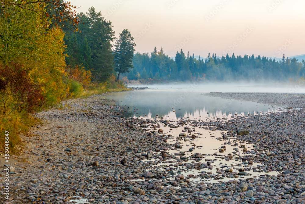 Wall mural early foggy morning Autumn scene on the flathead river, Montana