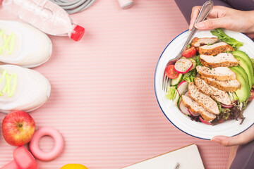 fitness and active healthy lifestyles Concept.A plate of chicken breast salad