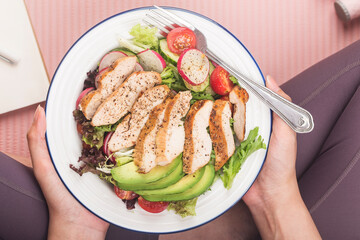 fitness and active healthy lifestyles Concept.A plate of chicken breast salad