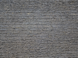 A plowed field. Top view from the drone. Agricultural background