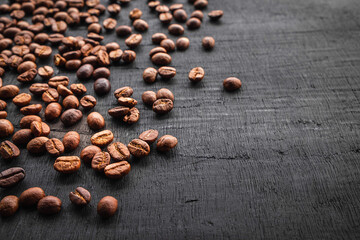 Coffee beans roasted on a black background
