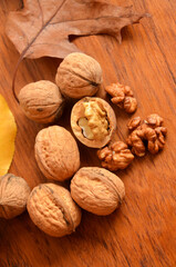 walnuts on wooden background close up