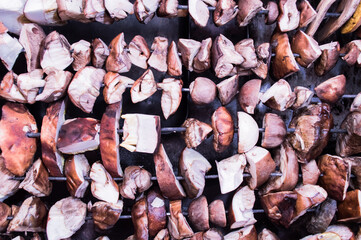 Many mushrooms are dried on the stove. harvesting mushrooms for the winter. Top view