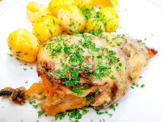 Roasted sleeves chicken with potatoes and barbecue sauce