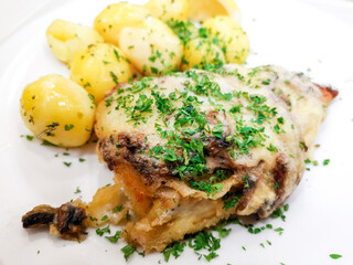 Roasted sleeves chicken with potatoes and barbecue sauce
