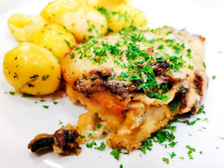 Roasted sleeves chicken with potatoes and barbecue sauce