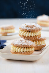 Delicious hazelnut shortbread sandwiches filled with vanila cream. Christmas recipe.