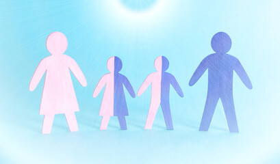 Figures of family people of father, mother and children on a blue background. Human genetics and...