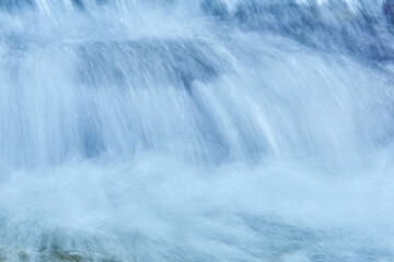 natural background - the jets of the waterfall are blurred in motion