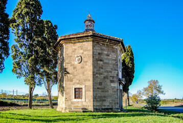 Naklejka premium Oratory of San Guido at sunset. It was built by the Gherardesca family in front of the famous 