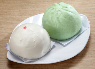 Baozi are a type of steamed, filled bun or bread-like item in various Chinese cuisines, as there is much variation as to the fillings and the preparations. 