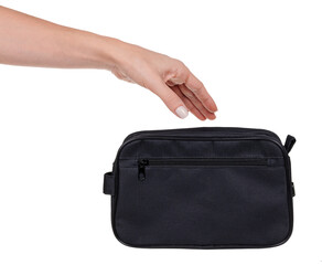Hand with mens cosmetic bag for hygiene supplies, isolated on white background.