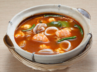Tom yum or tom yam  is a type of hot and sour Thai soup, usually cooked with shrimp (prawn) Tom yum has its origin in Thailand. 