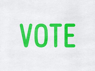 Vote - word on paper background