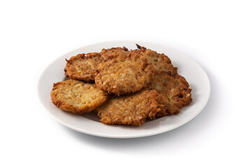 Traditional Jewish latkes or potato pancakes isolated on white background
