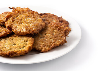 Traditional Jewish latkes or potato pancakes isolated on white background