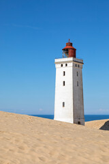 Fototapeta na wymiar Rubjerk Knude Fyr, famous lighthouse in the North Sea dunes of Denmark