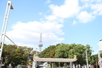 A bus stop and Nagoya TV Tower which appear of  golden dolphins