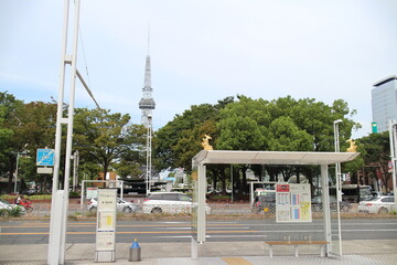 A bus stop and Nagoya TV Tower which appear of  golden dolphins