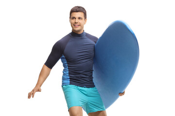 Man running with a surfboard