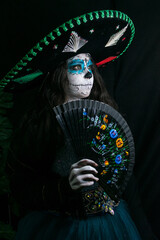 La Catrina costume like charro wiith a mexican hat for the Day od the dead